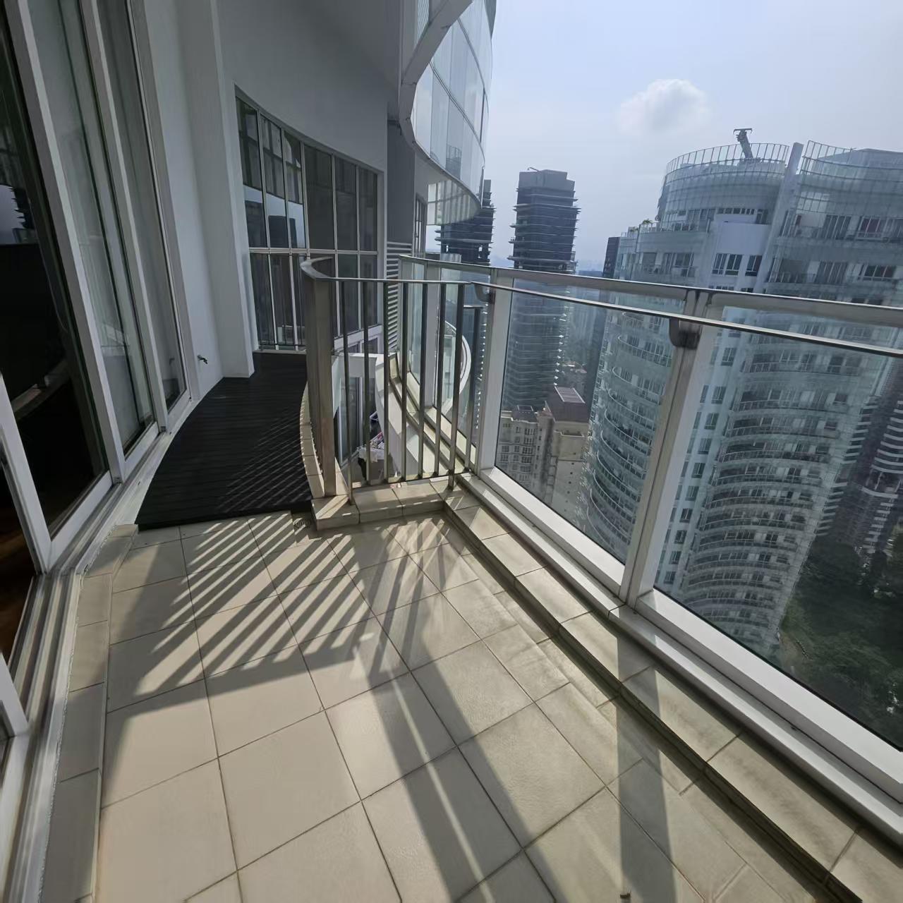 Bare balcony tiles before decking