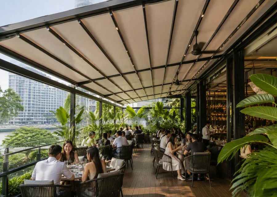 Retractable fabric awning over an outdoor terrace